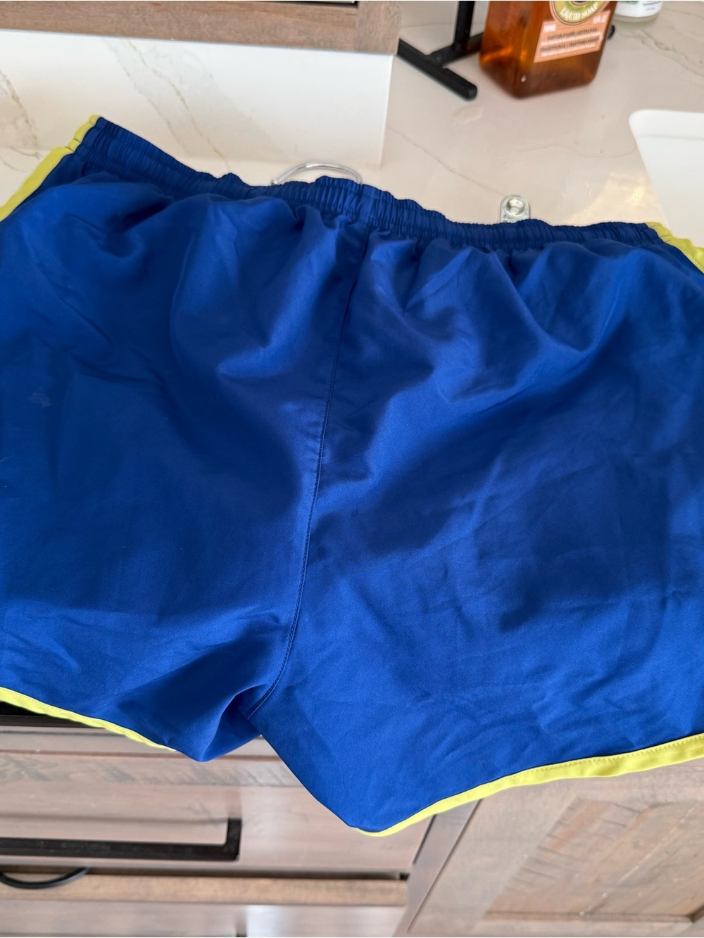 Nike Women’s Royal Blue Athletic Shorts with Yellow Trim